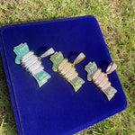 Load image into Gallery viewer, DUBSS - Iced Out Hand Dollar Pendant
