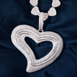 Load image into Gallery viewer, DUBSS - Iced Out Tilted Heart Pendant
