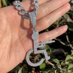 Load image into Gallery viewer, DUBSS - Iced Out Wheel Chair Gang Pendant
